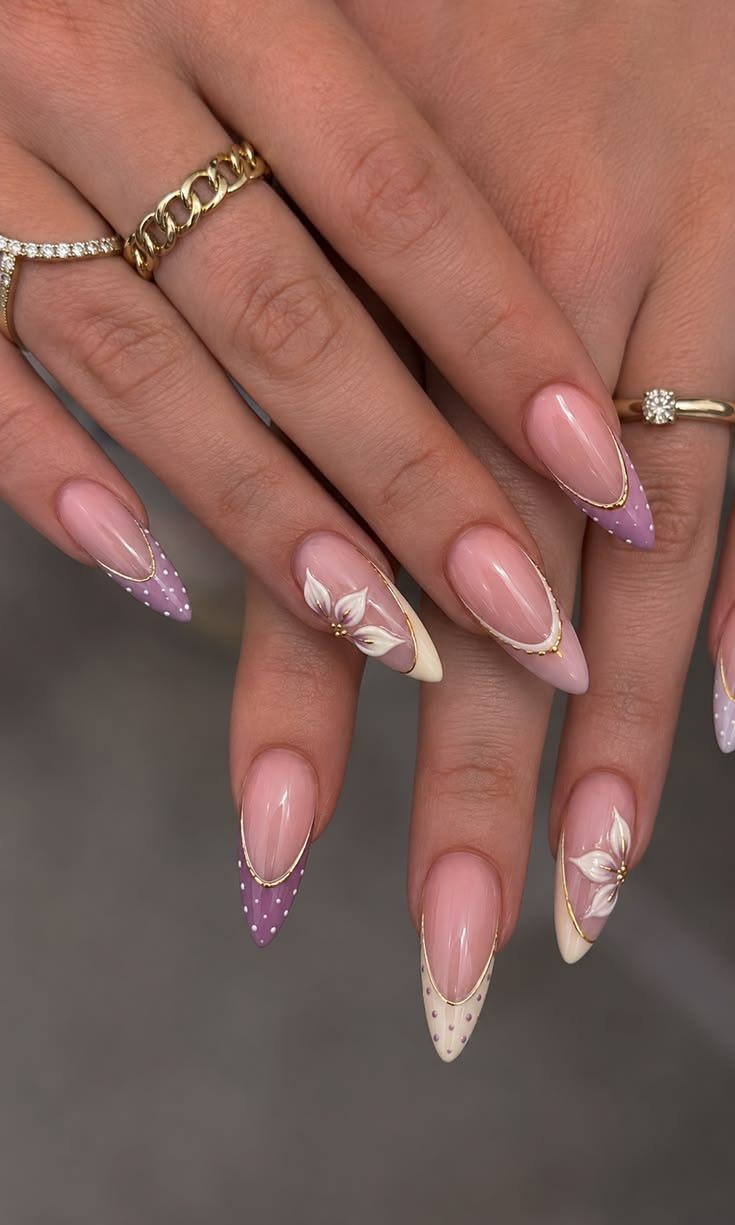 Lavender almond nails with soft floral detail by My Royal Nails & Spa in Humble, TX