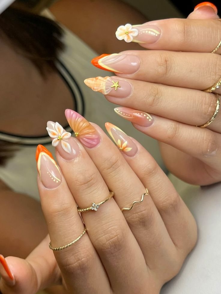 Orange French tips with painted daisies by My Royal Nails & Spa in Humble, TX